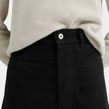 Kowtow Sailor Jeans in black close up showing high rise waist and button closure detail