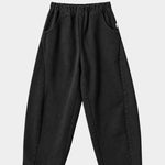 Le Bon Shoppe Arc Pants in black canvas flat lay showing elastic waistband, curved legs and oversized pockets. YUCCA Denver