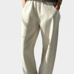Le Bon Shoppe Arc Pants Naturel styled with an olive tank and yellow sandals at YUCCA Denver