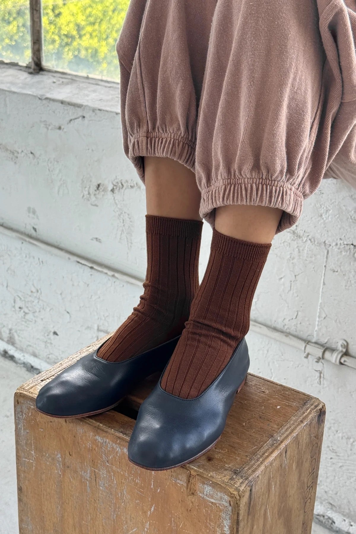 Le Bon Shoppe Espresso ribbed crew socks styled with powder blue ballet flats and pale pink gathered trousers