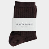 Espresso brown Le Bon Shoppe Her Socks folded with branded paper band on white fabric in direct sunlight