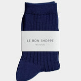 .
Le Bon Shoppe Her Socks in Midnight folded with branded paper band, showing deep navy ribbed cotton at YUCCA Denver