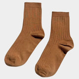 Pair of Peanut Butter Her Socks by Le Bon Shoppe showing warm brown color, fine ribbing and quarter crew length