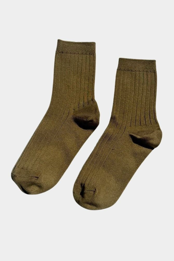 Pair of Le Bon Shoppe Her Socks in Pesto showing earthy olive color, fine ribbing and quarter crew length