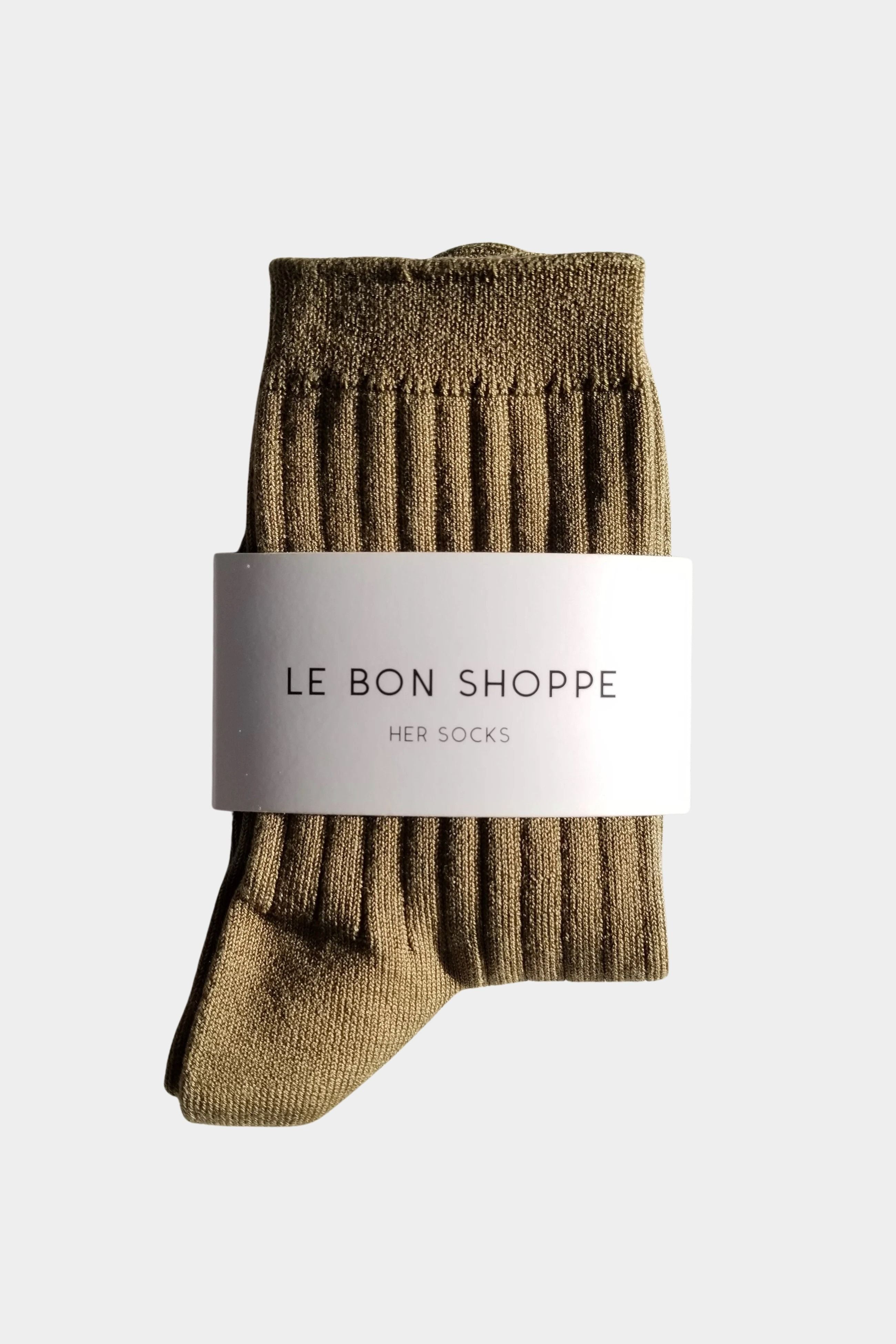 Le Bon Shoppe Her Socks in Pesto folded with branded packaging, showing olive ribbed cotton texture at YUCCA Denver