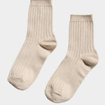 Pair of Porcelain Her Socks showing quarter crew length, ribbed texture and reinforced toes