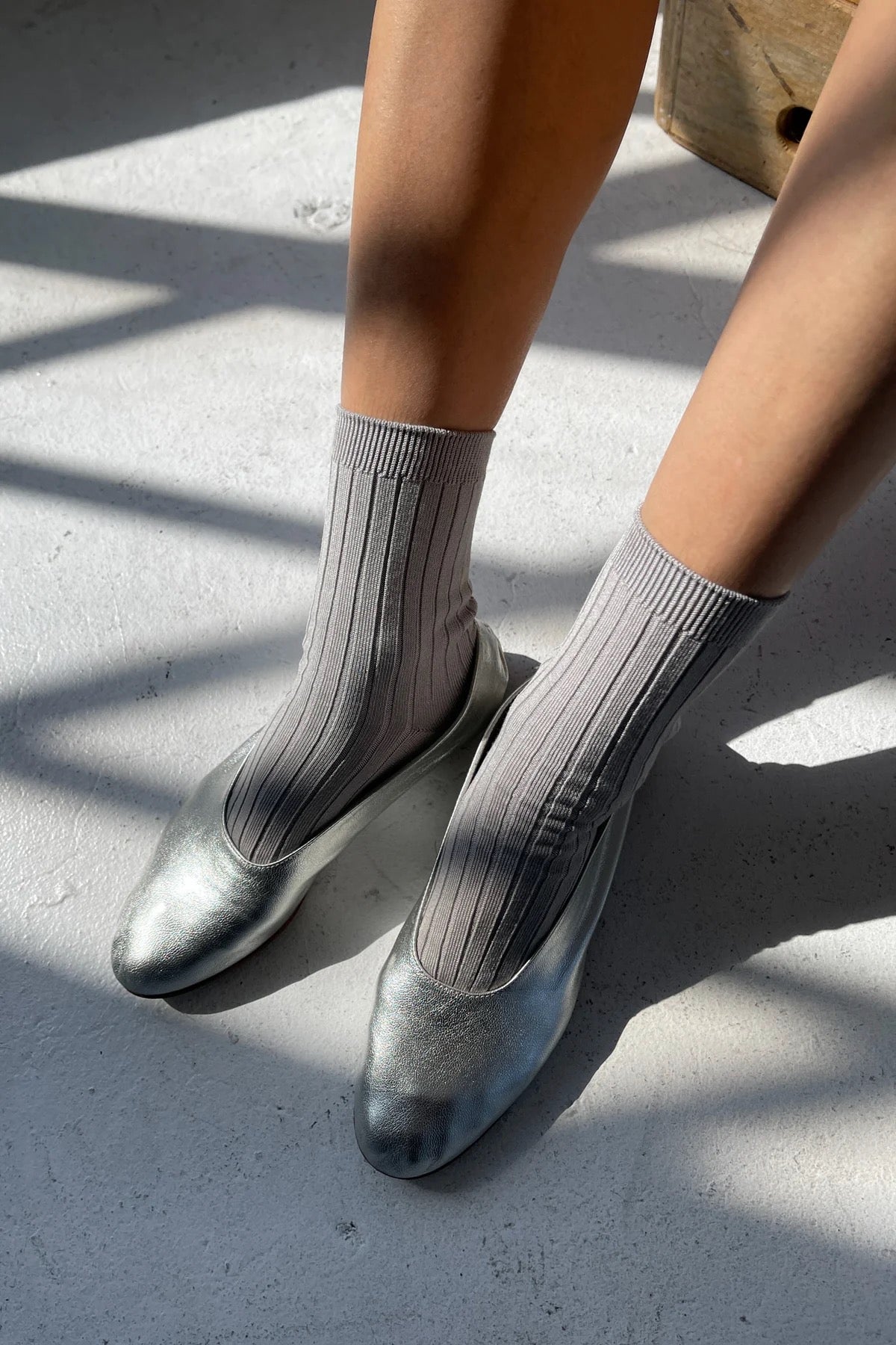 Close-up of Le Bon Shoppe Her Socks in Stone worn with silver ballet flats, highlighting ribbed texture and fit.