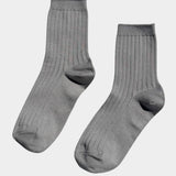 Pair of Le Bon Shoppe Her Socks in Stone, showing soft gray color, ribbed knit and quarter crew length.