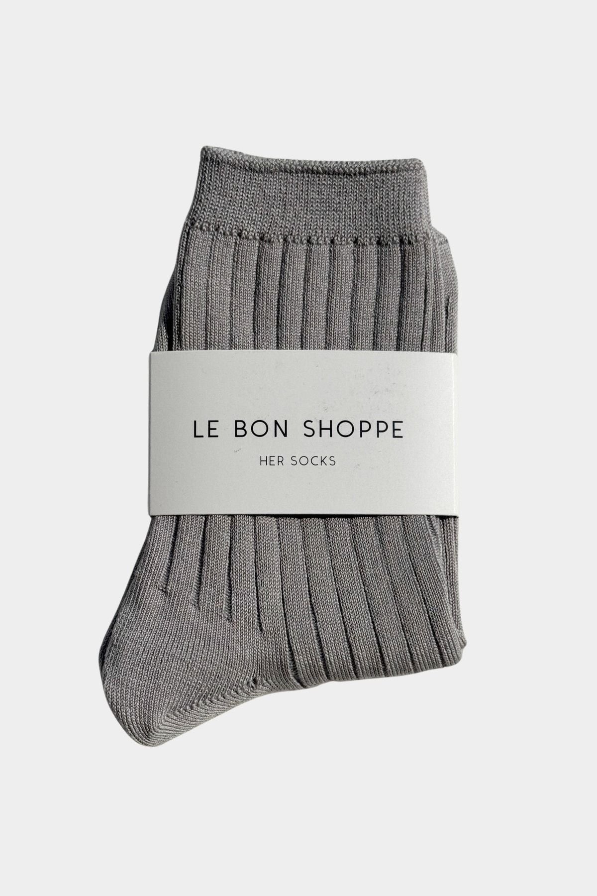 Le Bon Shoppe Her Socks in Stone, folded with branded packaging showing fine ribbed cotton texture at YUCCA Denver.