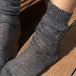 Le Bon Shoppe Mohair Veil Socks Charcoal worn gathered at the ankle close up