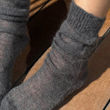 Le Bon Shoppe Mohair Veil Socks Charcoal worn gathered at the ankle close up