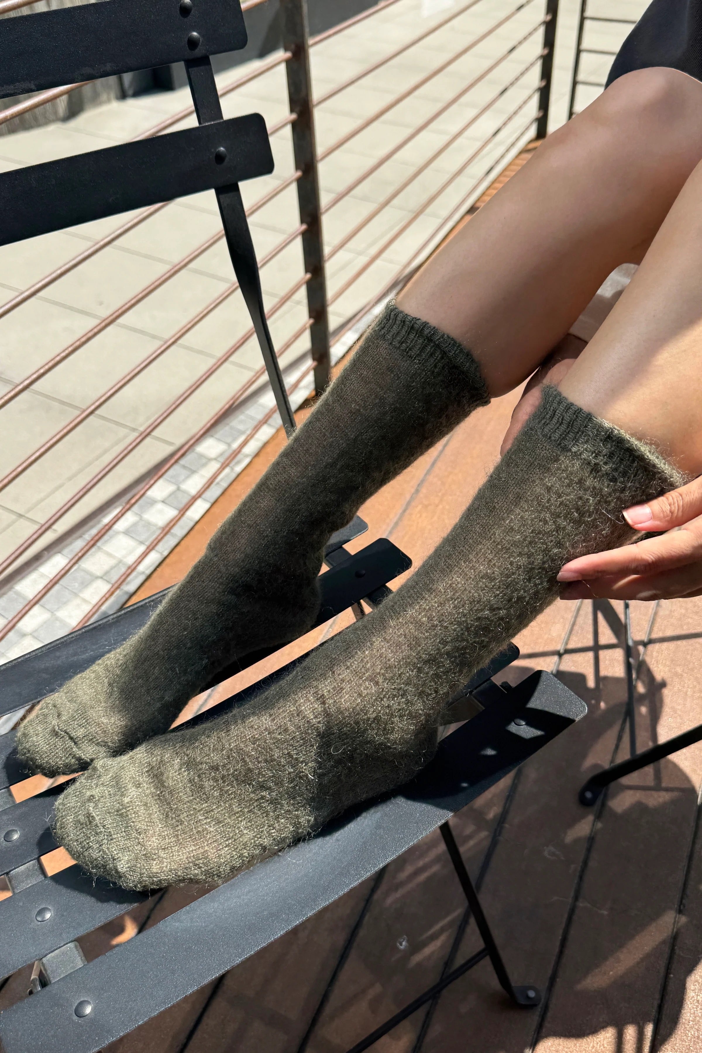Le Bon Shoppe Mohair Veil Socks Mountain Olive worn pulled up to show the brushed texture