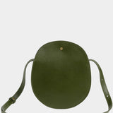 LINDQUIST Eggi bag in Olive with a rounded silhouette, spherical brass snap, and tonal stitching