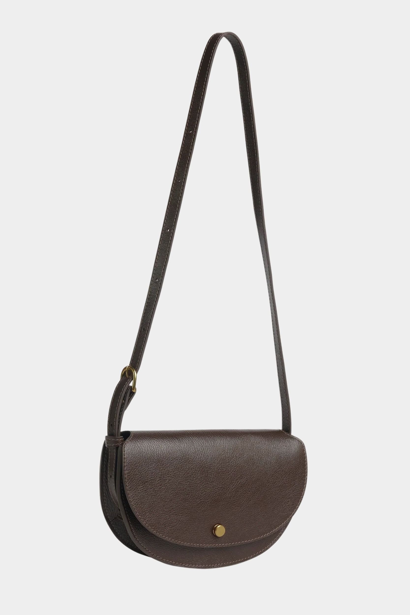 Mezzo leather crossbody bag in Chaga with an extended adjustable strap and brass closure, at YUCCA Denver