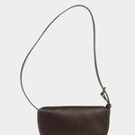 Rear view of the LINDQUIST Mezzo bag in Chaga showing its curved leather body and shoulder strap