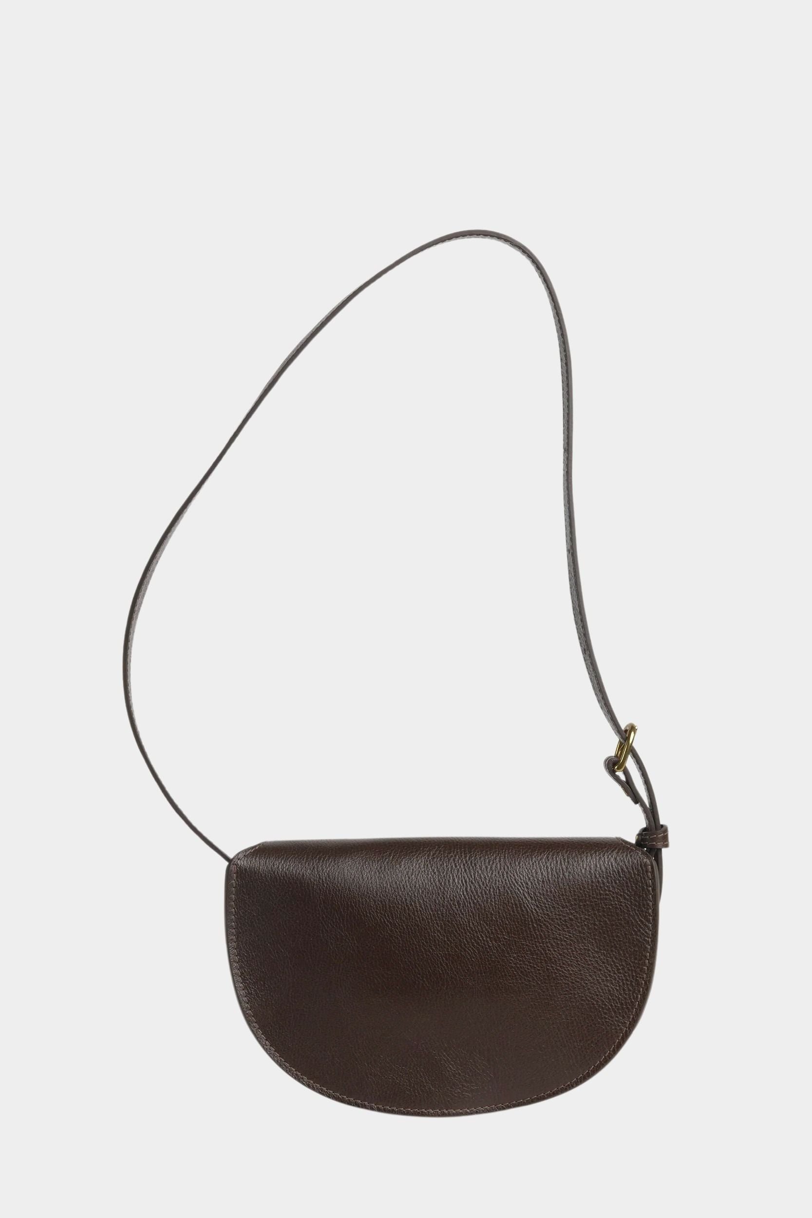 Rear view of the LINDQUIST Mezzo bag in Chaga showing its curved leather body and shoulder strap
