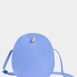 Lindquist Mini Eggi periwinkle leather crossbody front view circular silhouette