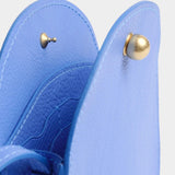 Lindquist Mini Eggi periwinkle leather bag interior close up showing snap hardware