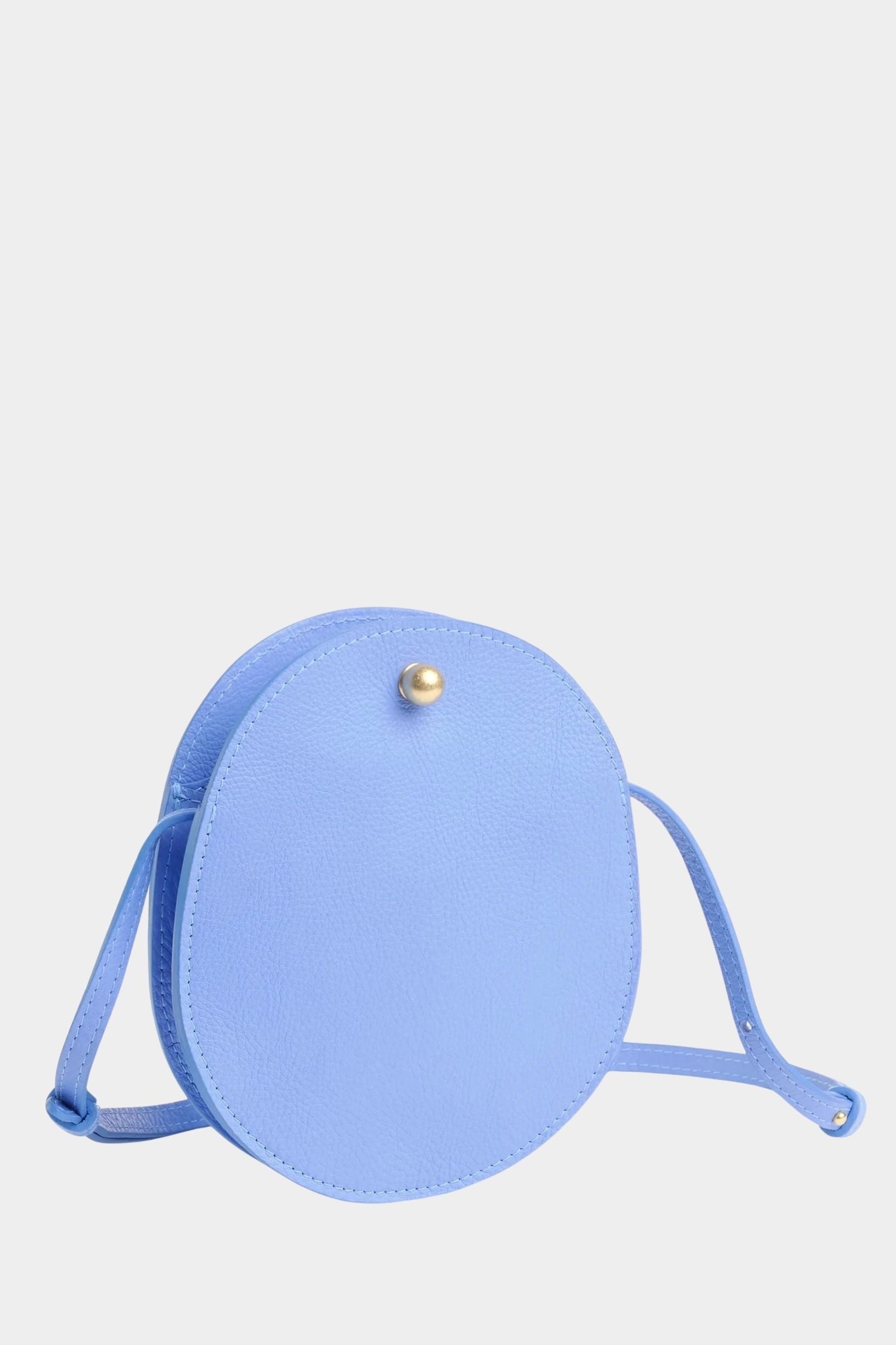 Lindquist Mini Eggi periwinkle circular leather crossbody front view with brass snap