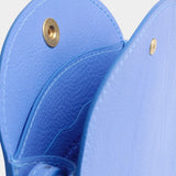 Lindquist Mini Eggi periwinkle leather bag interior view with snap closure and compartment