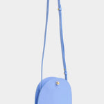 Lindquist Mini Eggi leather crossbody bag in periwinkle full view with long adjustable strap