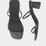 LOQ Gael heeled sandal black leather square toe tubular strap block heel top view