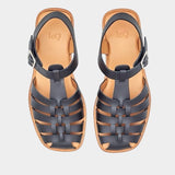 LOQ Rio sandal in black leather fisherman sandal pair top view showing woven upper and ankle strap
