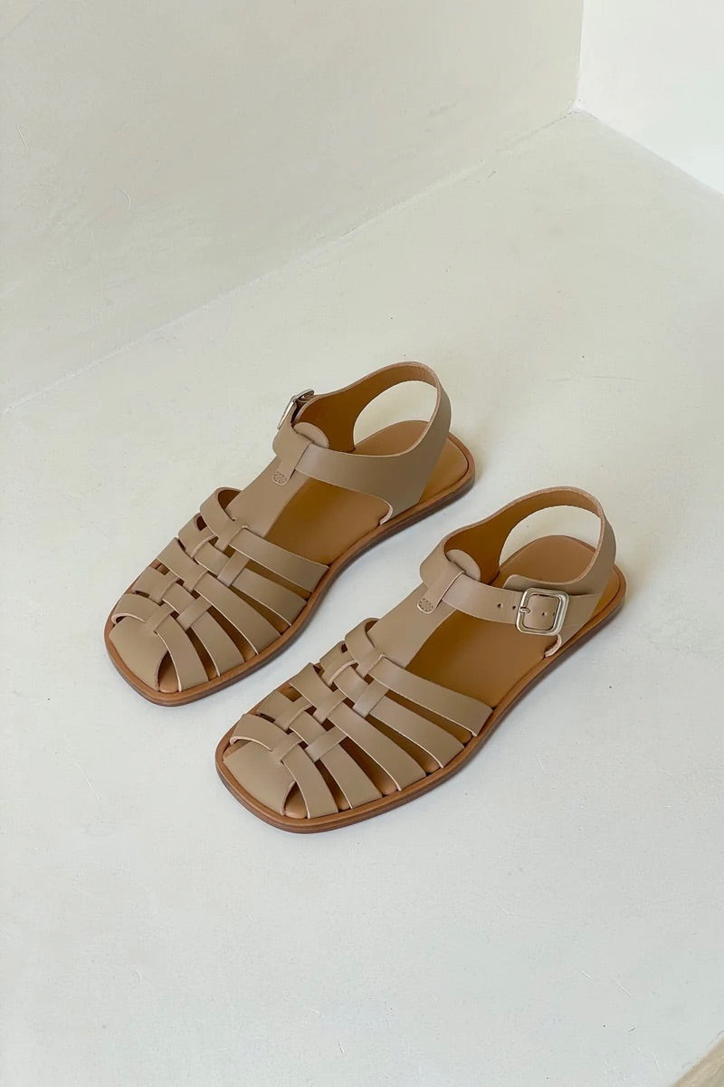 LOQ Rio sandal in taupe leather fisherman sandals angled view showing woven leather straps and flat sole