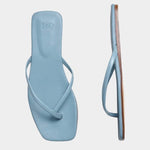 LOQ Salina sandal in ocean blue leather thong sandal angled view showing slim straps and flat sole