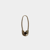 Loren Stewart Cirque Safety Pin Earring in 14k yellow gold with black diamond at YUCCA Denver