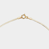 10K gold herringbone necklace with secure clasp closure detail.