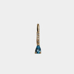 14K gold drop hoop earring with pear-shaped topaz and diamond accents.
