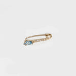 14K gold hoop earring with blue topaz drop and secure clasp closure.