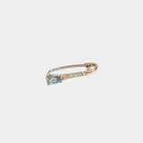 14K gold diamond hoop earring with pear-cut blue topaz.