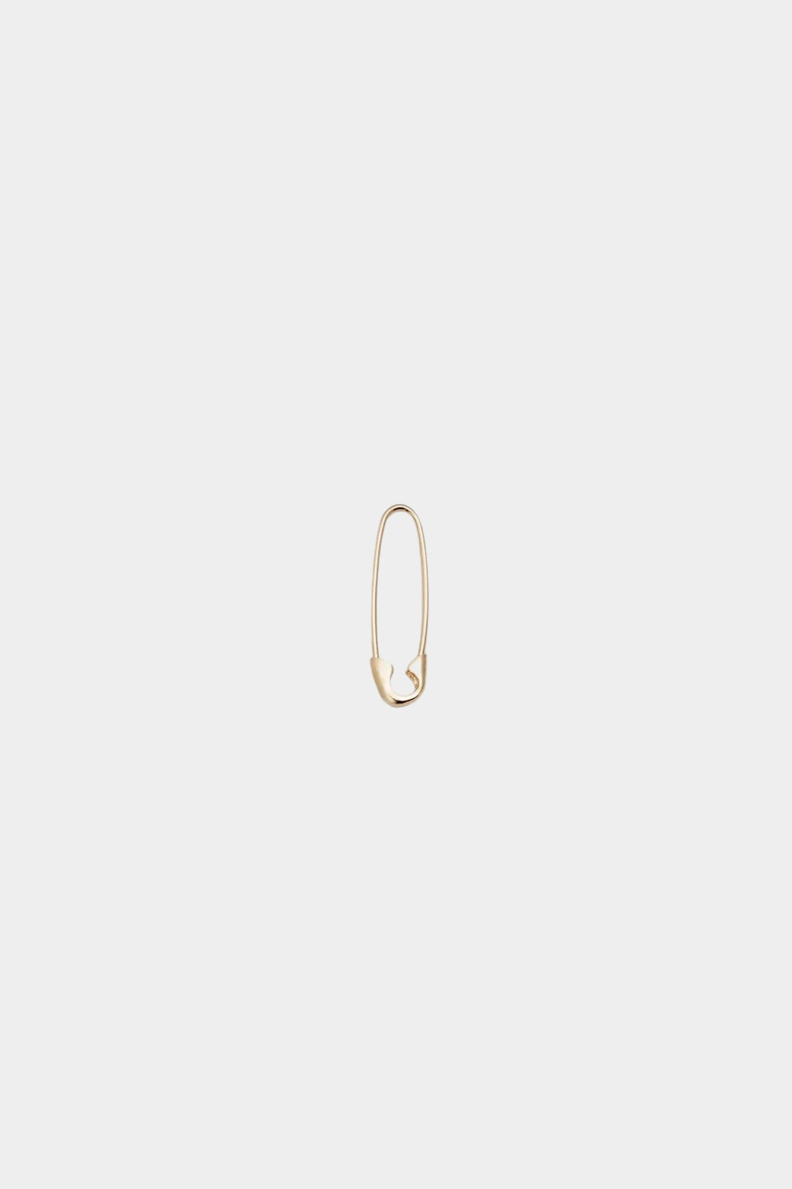 14K gold safety pin earring with elongated minimalist design.
