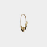 Single 14k yellow gold Pisces fish earring displayed at YUCCA Denver