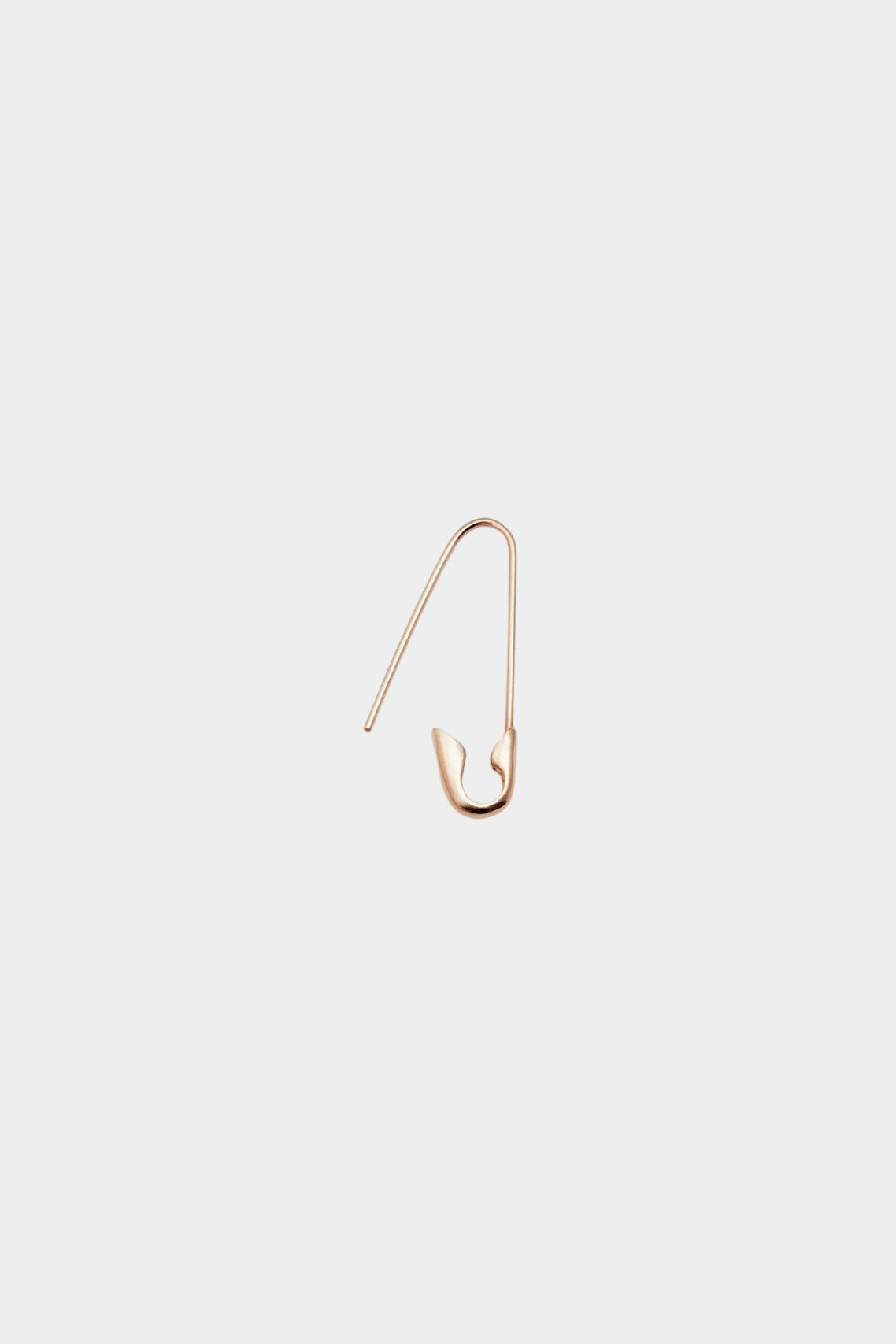 14K gold elongated hoop earring with secure hinged closure.