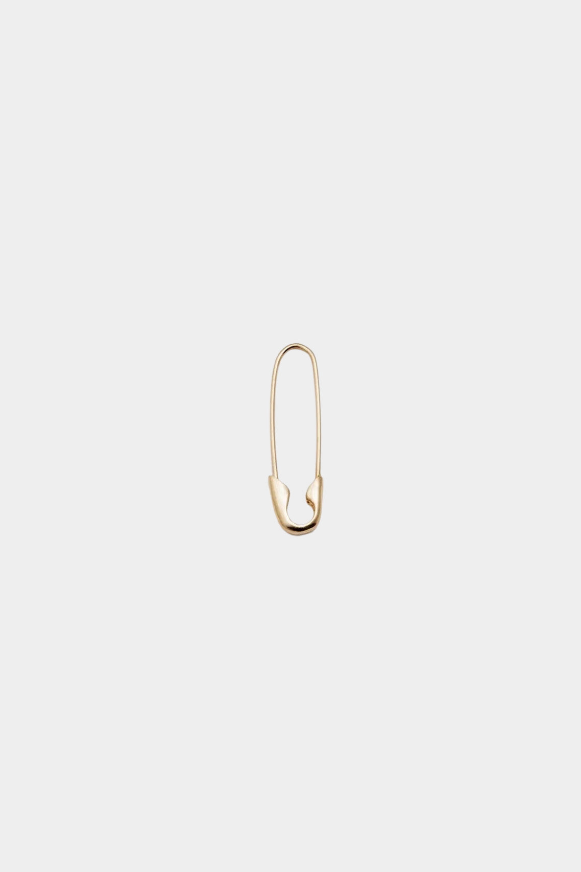 14K gold elongated hoop earring with modern safety pin design.