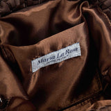 Interior of Maria La Rosa Mini Game Bag in Dark Brown showing satin lining and logo label