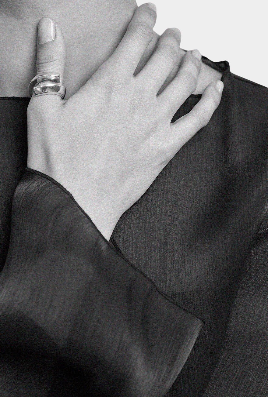 Maslo Jewelry wrap ring in sterling silver worn on hand