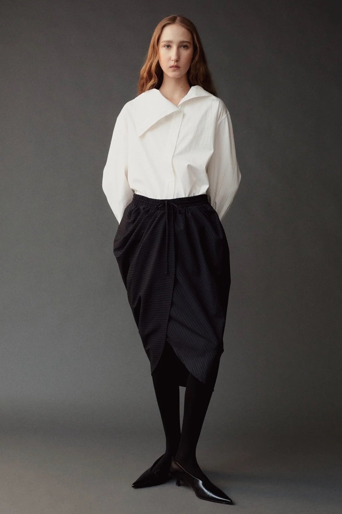 Front view of the Mijeong Park Asymmetric Cotton Shirt in white at SHOP YUCCA in Denver