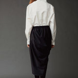 Back view of the Mijeong Park Asymmetric Cotton Shirt showing the raised collar and relaxed shape