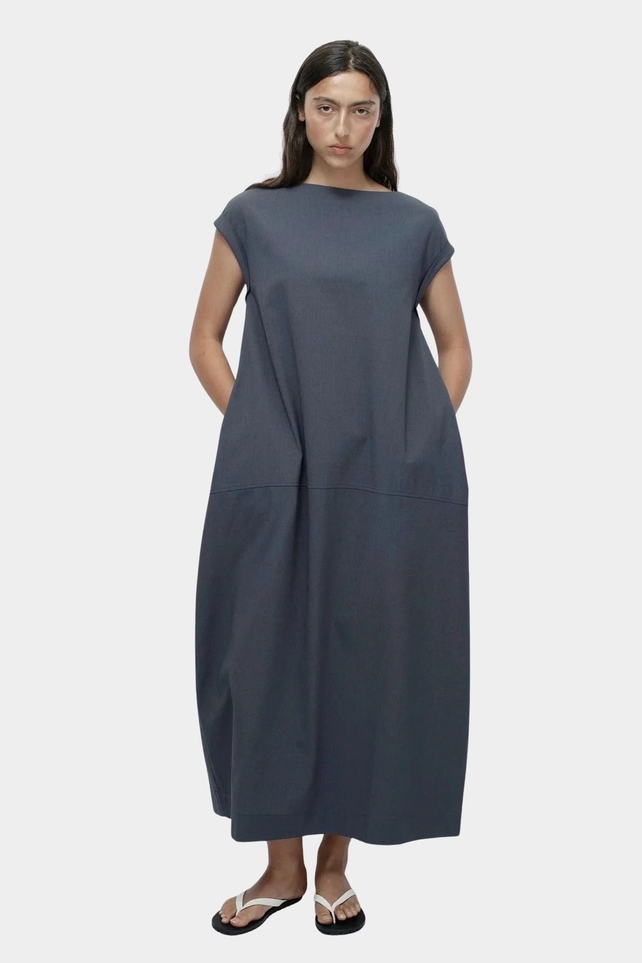 Mijeong Park balloon maxi dress blue gray full length front view relaxed balloon silhouette side pockets