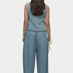 Mijeong Park blue minimal knit tank back view sleeveless cotton linen knit top with relaxed silhouette styled with wide leg trousers
