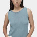 Mijeong Park blue minimal knit tank sleeveless cotton linen knit top styled with wide leg blue trousers minimalist summer outfit