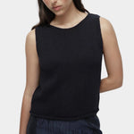 Mijeong Park navy minimal knit tank with boat neckline in cotton linen knit, sleeveless minimalist summer knit top styled with navy skirt