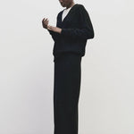 Black cashmere blend knit midi skirt by Mijeong Park