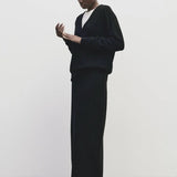 Black cashmere blend knit midi skirt by Mijeong Park