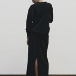 Black cashmere blend knit midi skirt by Mijeong Park