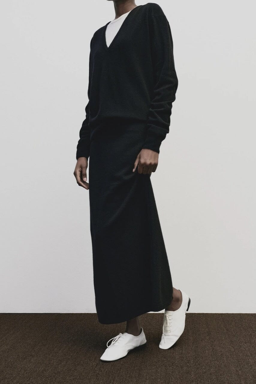 Black cashmere blend knit midi skirt by Mijeong Park